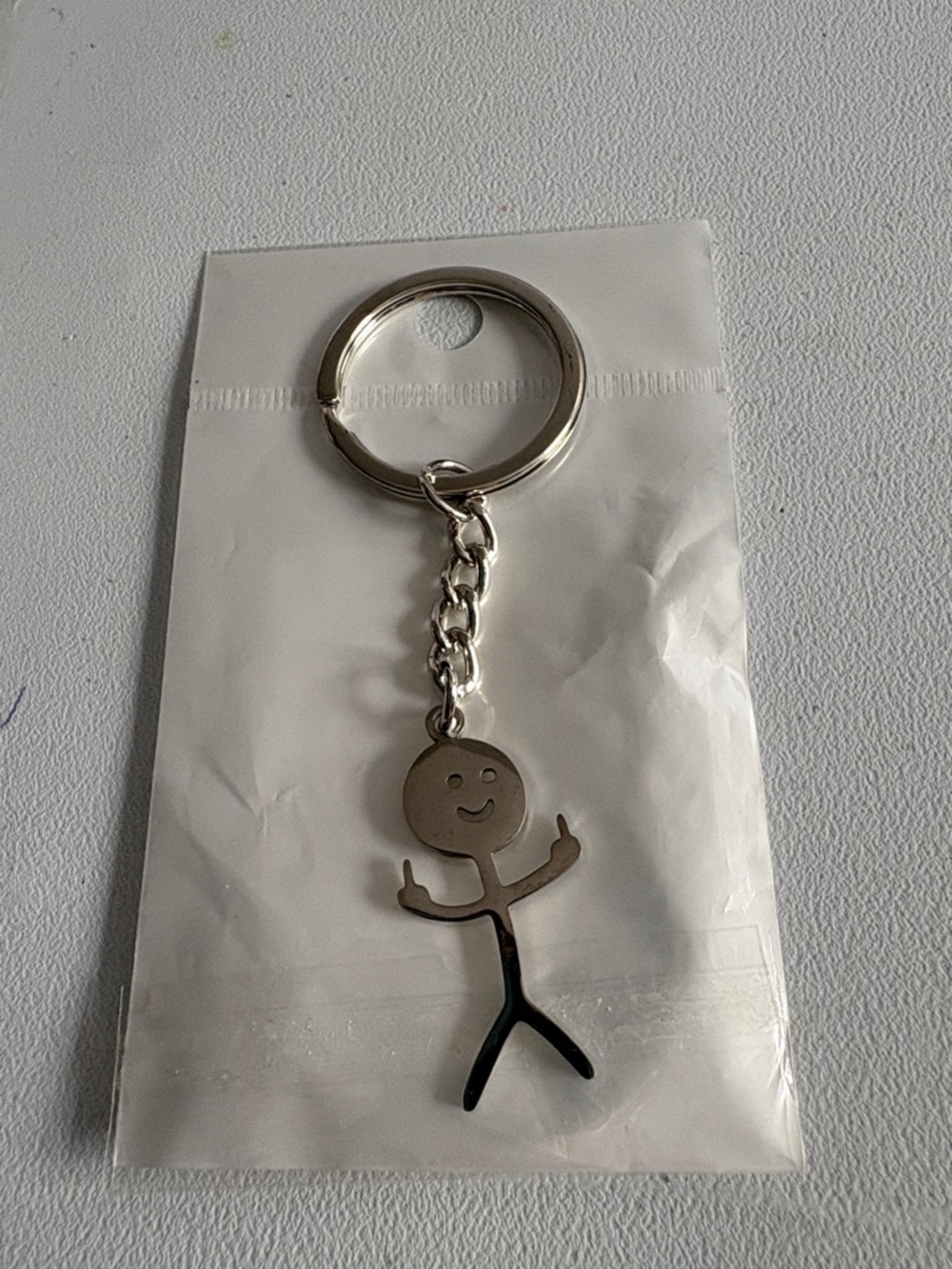 Silver Stick-Figure Keychain with Playful Gesture - Men Accessories